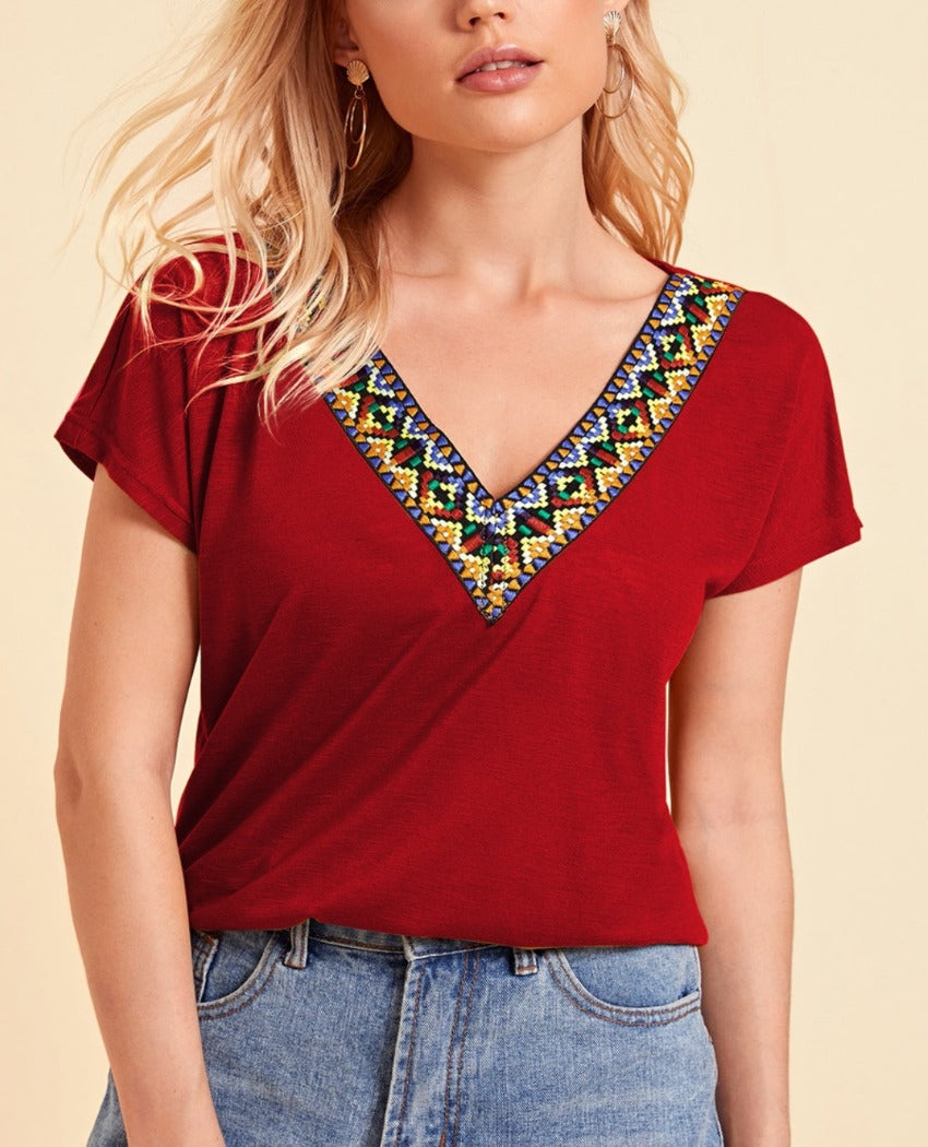 Elevate your casual style with our vibrant V-Neck Short Sleeve T-Shirt. Featuring a chic tribal pattern, it offers comfort and versatility.