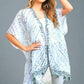 Green kimono for women with airy, relaxed fit and boho design.