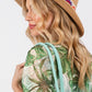 Floral embroidered straw hat for stylish sun protection.