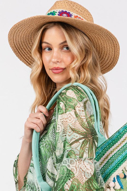 Colorful and breathable straw sun hat with embroidery.