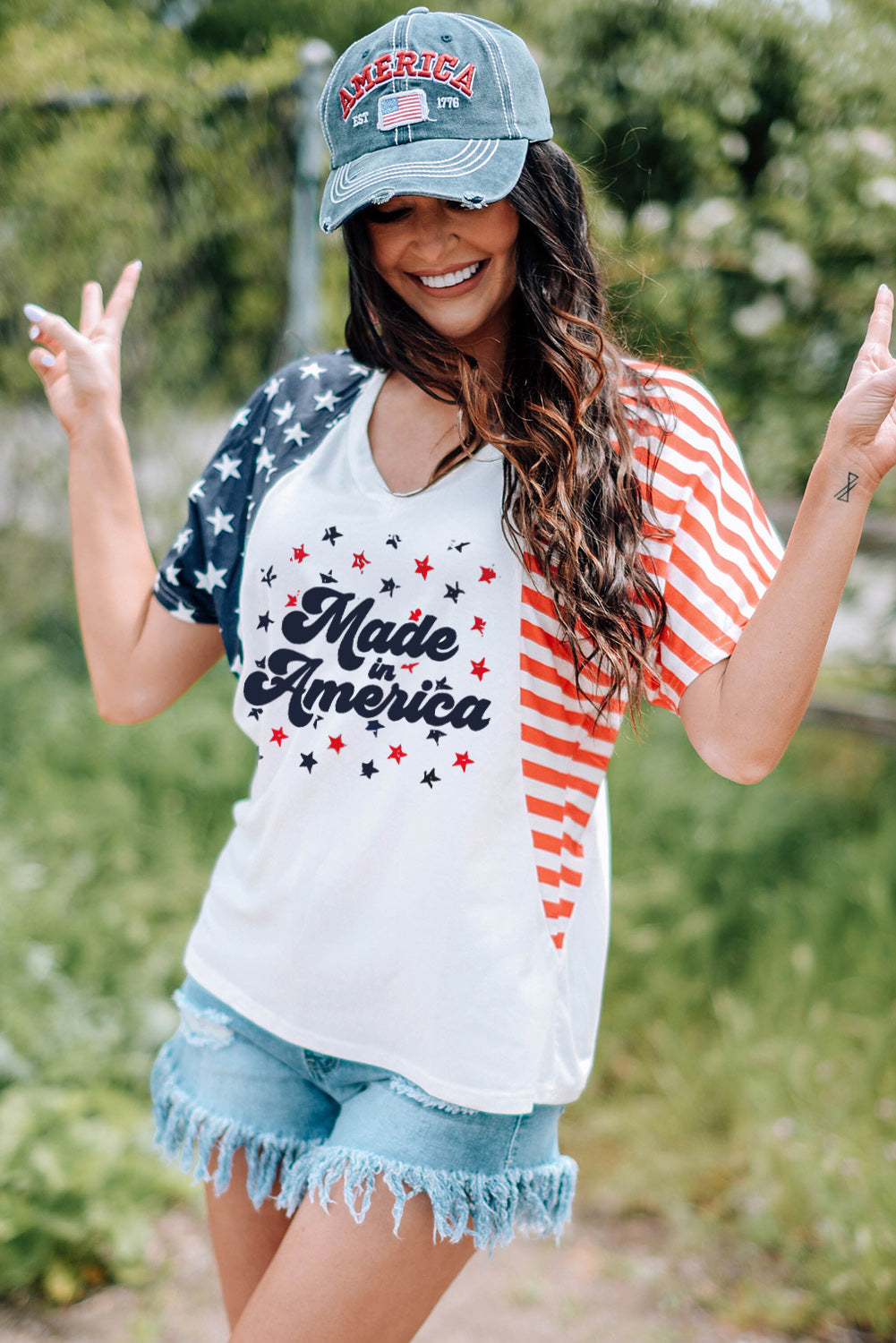 Shop the Stars & Stripes V-Neck Tee to flaunt your patriotic style! Comfortable, versatile, and perfect for any casual occasion