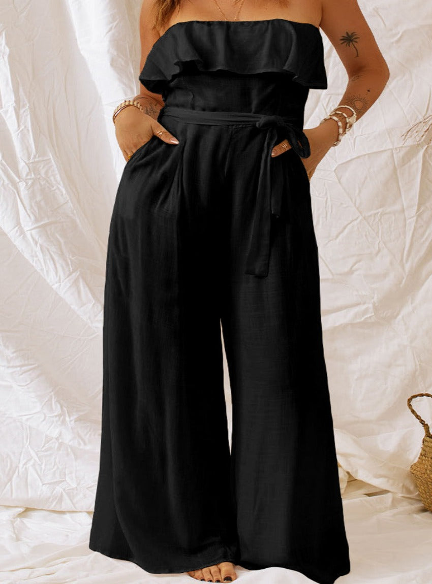 Elevate your style with our Tie-Waist Ruffled Strapless Jumpsuit. Flattering fit, chic design, perfect for any occasion. Available in white and black