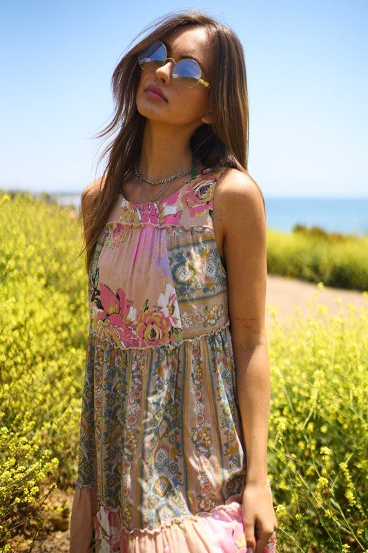 Vibrant boho chic maxi dress with floral and geometric prints