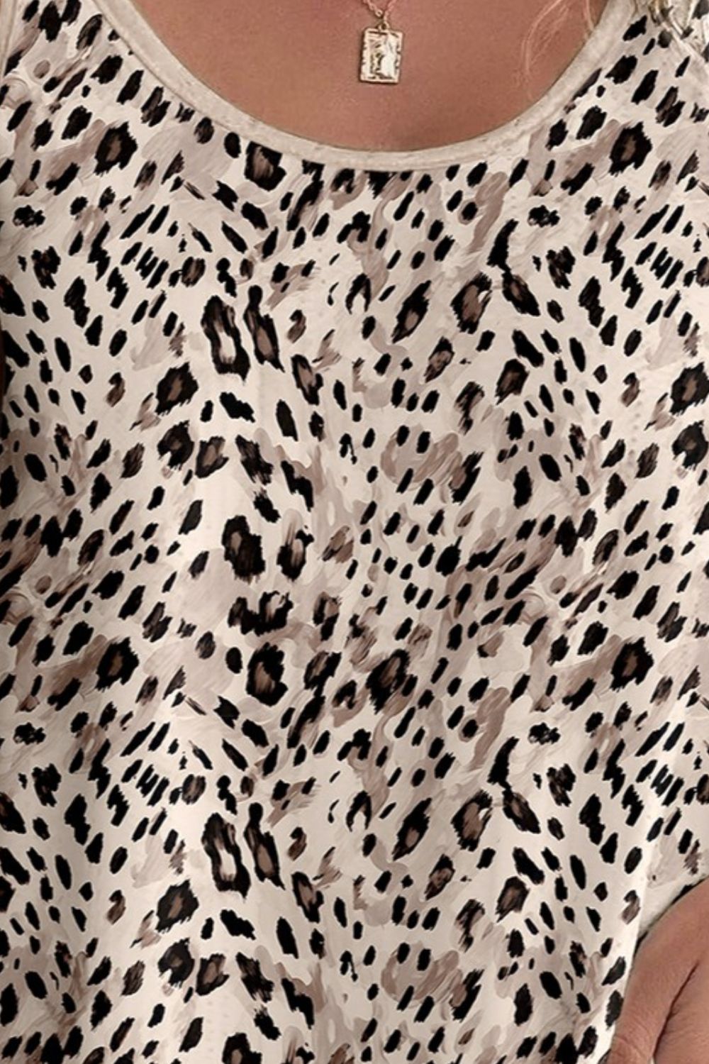 Beige leopard print tank top ideal for casual outings.