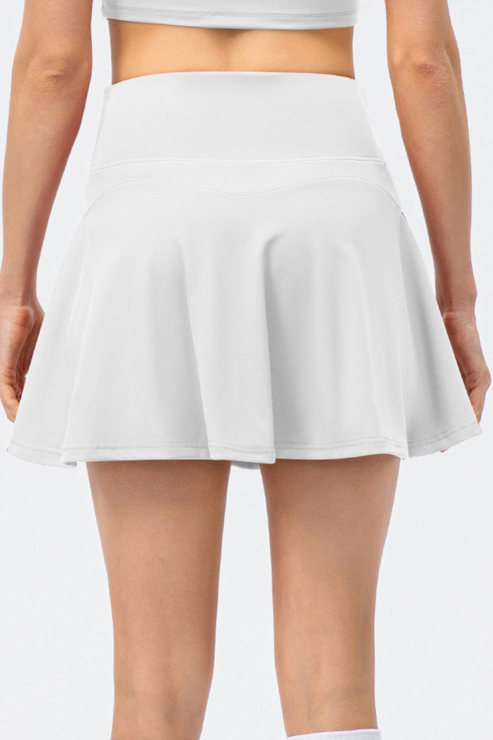 Shop the stylish High Waist Active Skirt with built-in shorts for comfort & elegance during your workouts or casual wear.