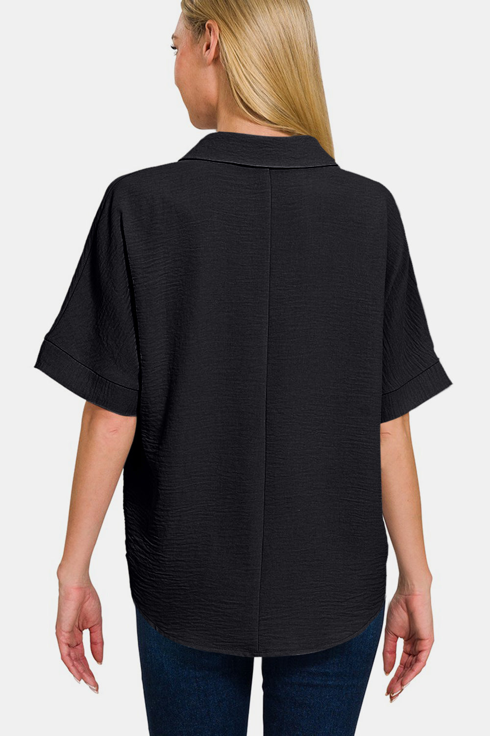 Timeless black collared blouse perfect for various occasions