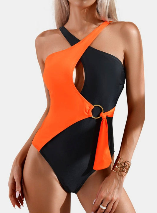 Discover elegance & comfort with our Cutout One-Piece Swimwear. Perfect for making a splash with bold colors and a flattering fit. Shop now!