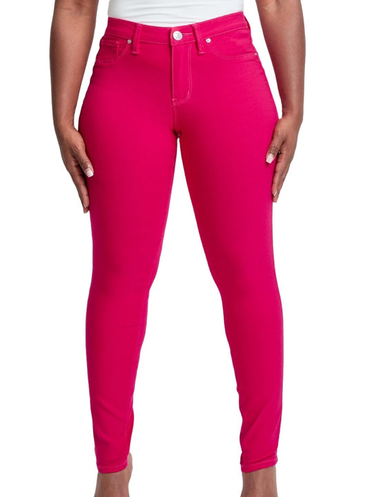 Bright pink mid-rise skinny jeans designed for a chic and modern look.