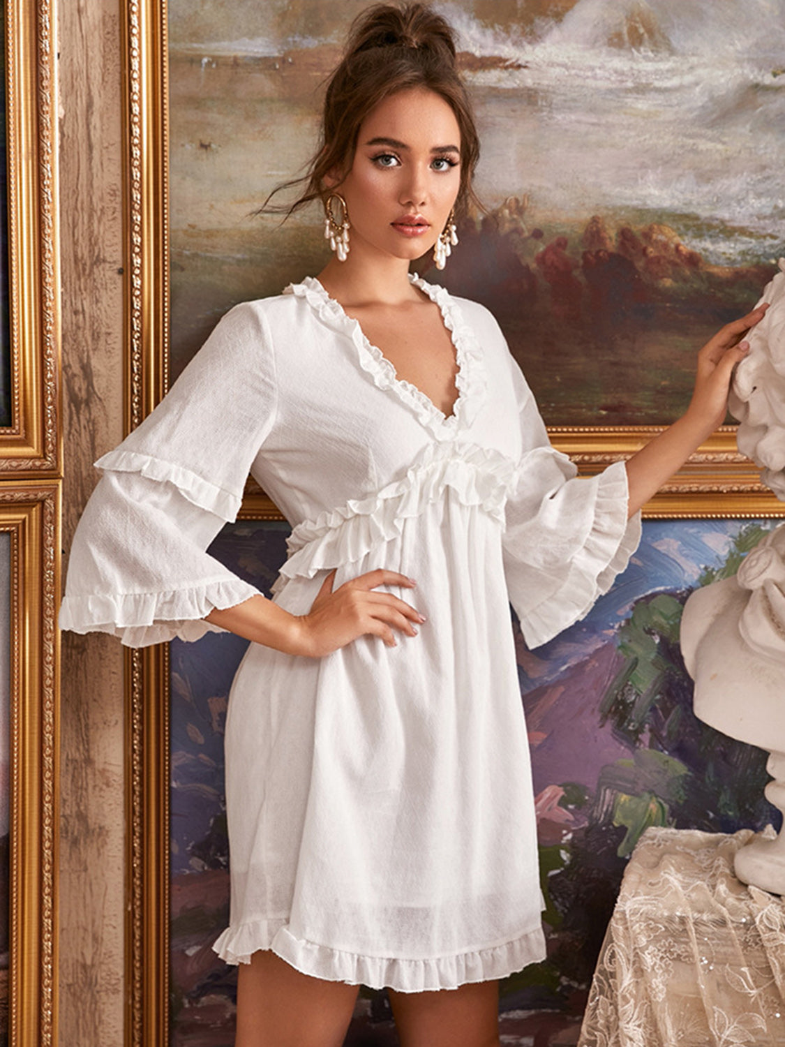 Embrace elegance with our Ruffled V-Neck Mini Dress – perfect for any occasion, blending comfort with timeless style.
