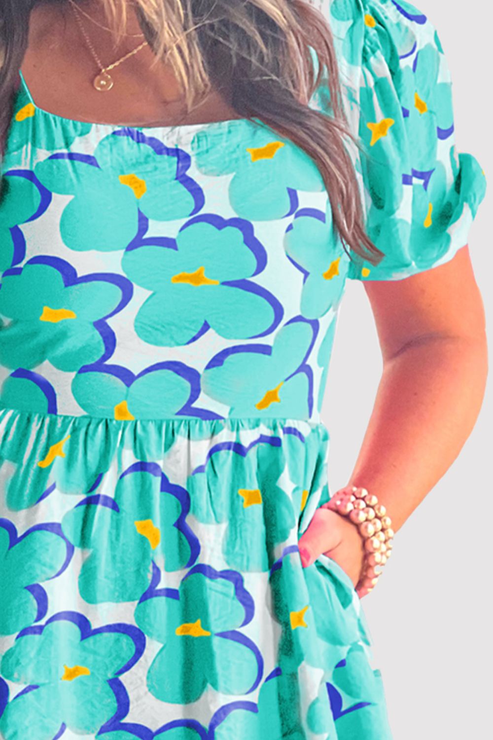 Chic teal or pink printed dress with a square neck and short sleeves, perfect for summer style and comfort.