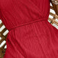 Red wrap front romper with flattering V-neckline.