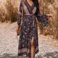 Flowy Bohemian Maxi Dress with colorful floral design.