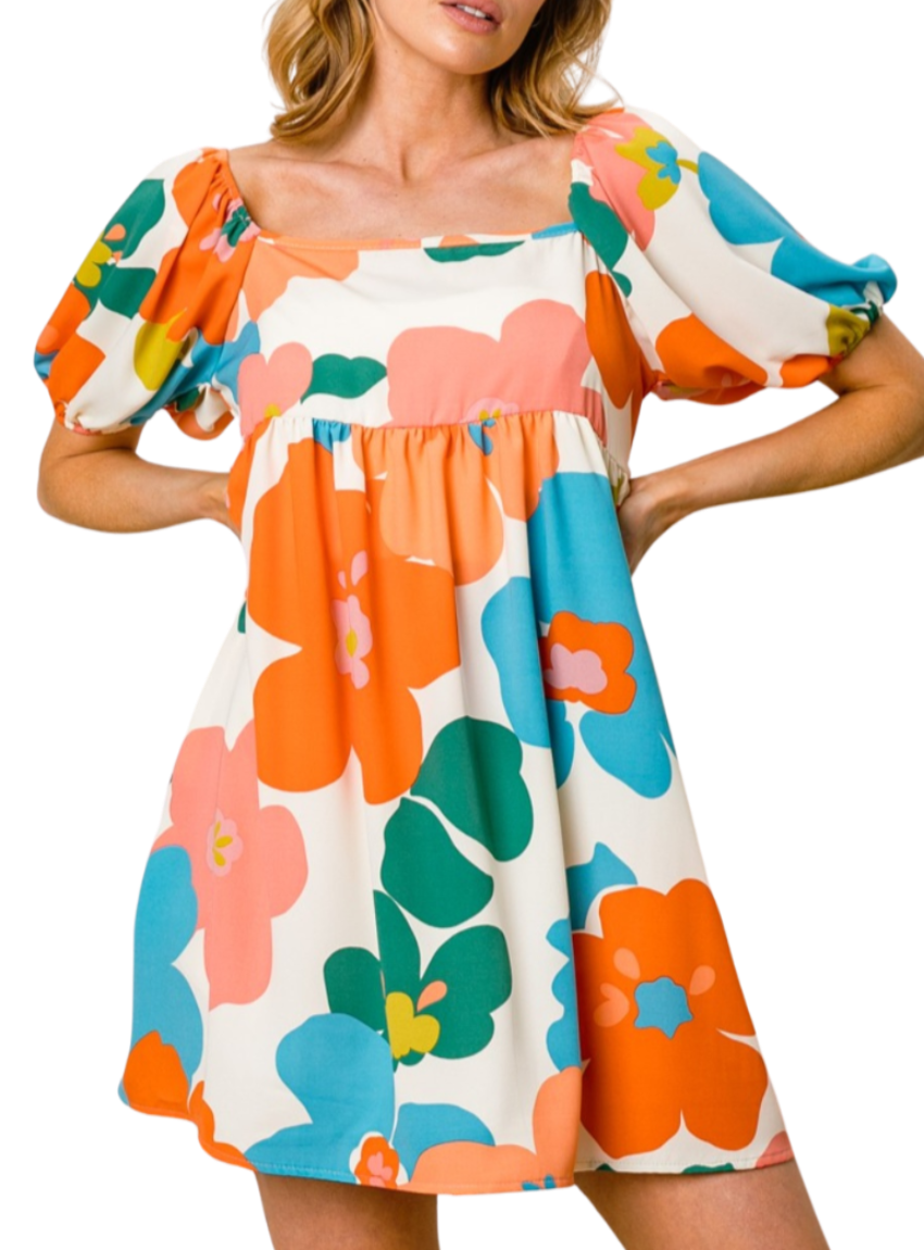 Shop the BiBi Floral Puff Sleeve Mini Dress - your go-to for a vibrant, easy-to-wear spring look that flatters and charms