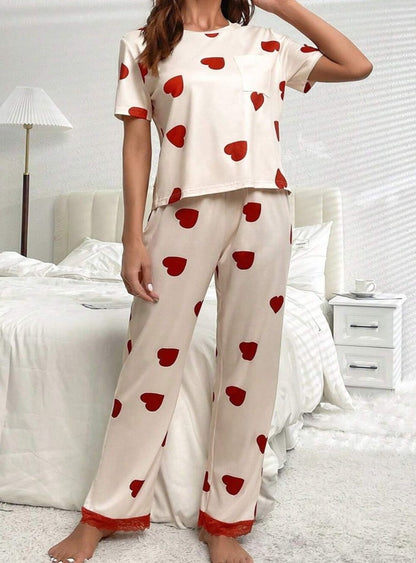 Cozy up in style with our heart-patterned lounge set, perfect for relaxed days at home with pockets for convenience and adjustable comfort.