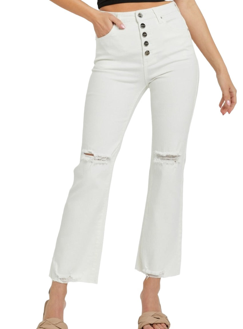White high-waisted jeans with distressed knee detailing and button fly closure.