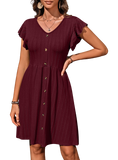 Elegant V-neck dress with playful ruffles and decorative buttons, perfect for any occasion. Available in six colors for a versatile wardrobe.