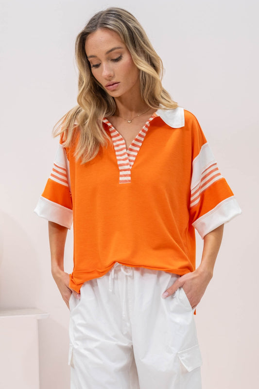 Relaxed fit orange top with stylish white and orange stripes