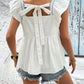 Chic embroidered blouse with a flattering square neck, breezy cap sleeves, and versatile style for any occasion.