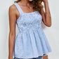Blue gingham top with smocked bodice
