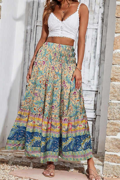 Vibrant bohemian maxi skirt with a colorful floral and paisley pattern