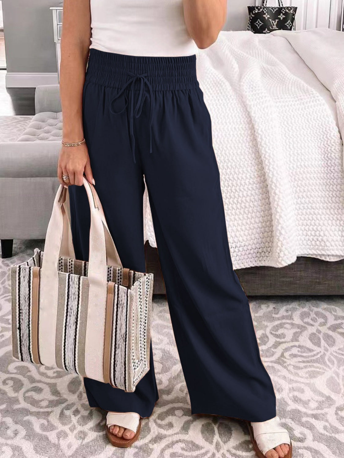 Wide-leg pants designed for comfort and style, available in a range of colors.