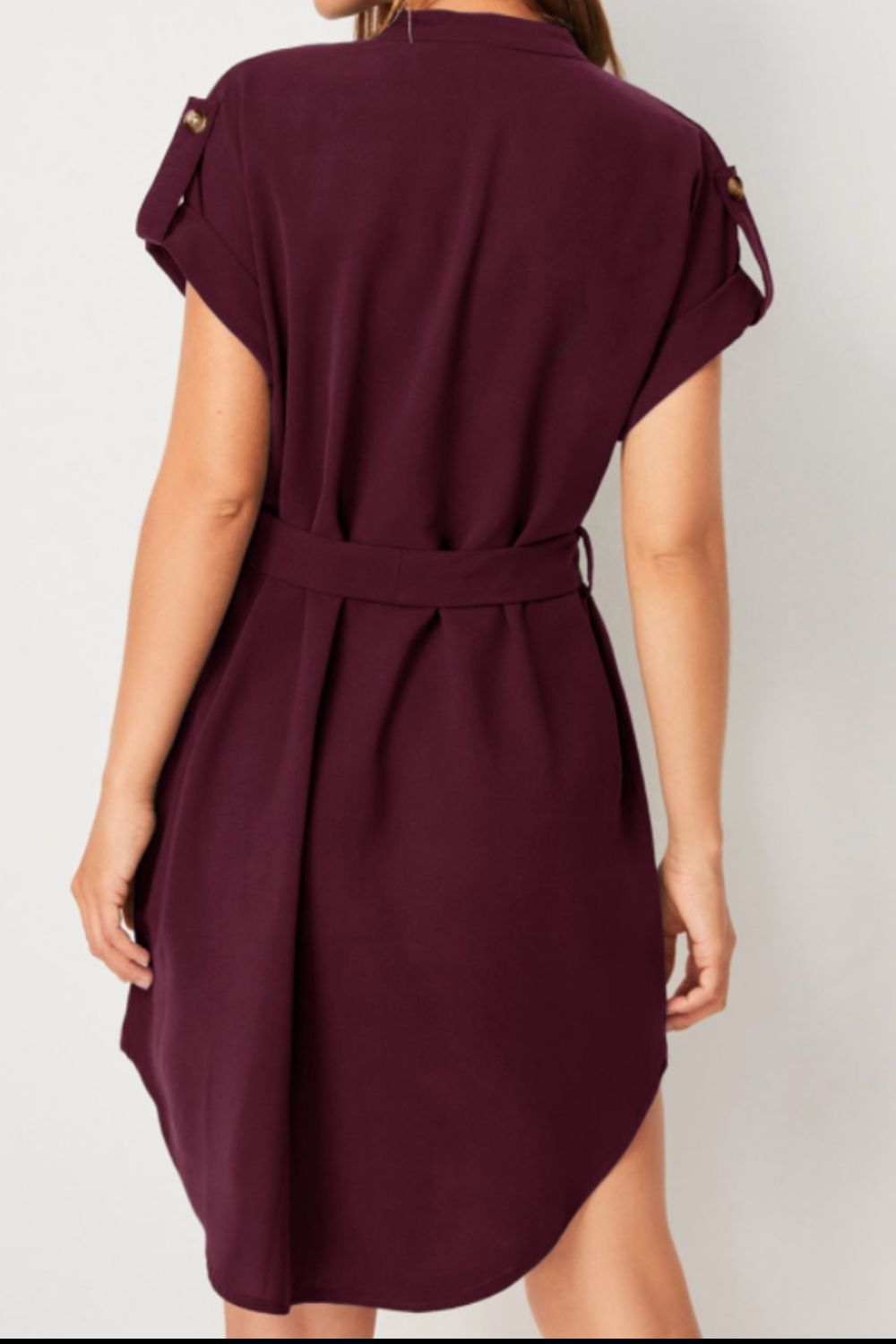 Discover the chic Tied Notched Dress! Flattering tie-waist, versatile style, available in 6 colors. Perfect for any occasion. Shop now!