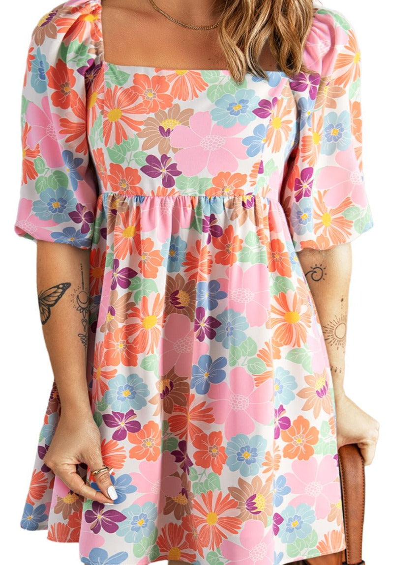 Embrace summer with this floral Printed Half Sleeve Mini Dress, perfect for any occasion. Fresh, flirty, and fabulously feminine!