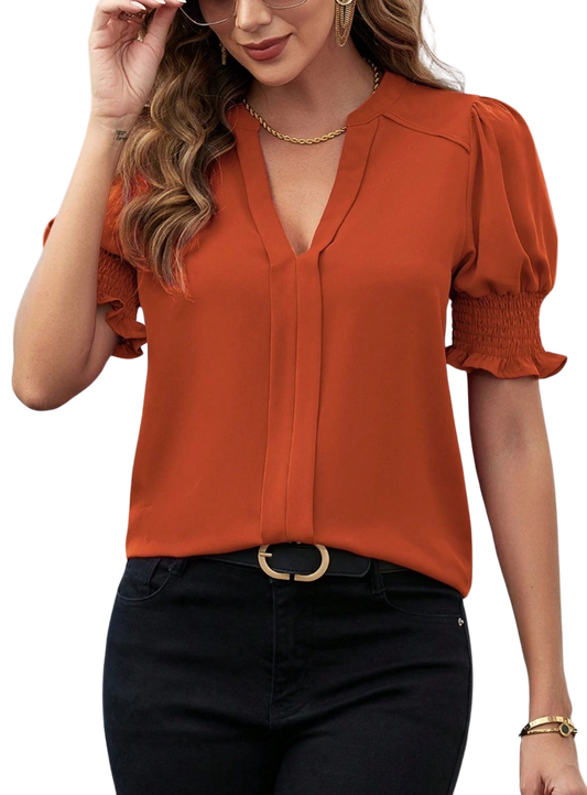 Orange notched short sleeve blouse with stylish ruffle details
