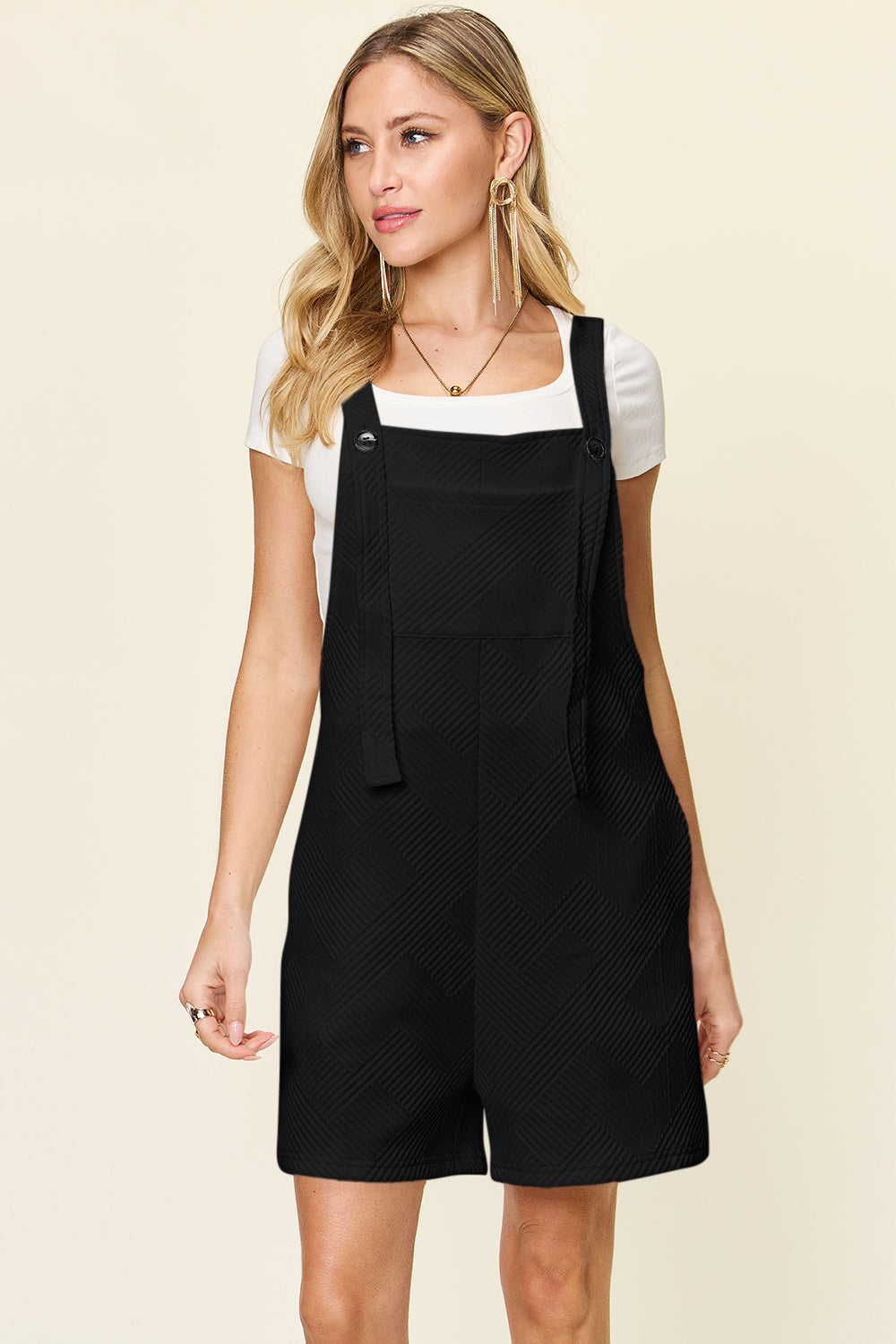 Lean in to your playful side with this black romper... flattering on any body shape and size. Get yours today!