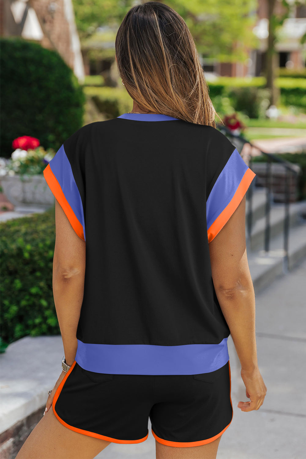 Sporty black and blue short-sleeve top and shorts