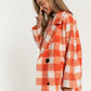 Chic boucle plaid coat for women, featuring side pockets and a lapel neck.
