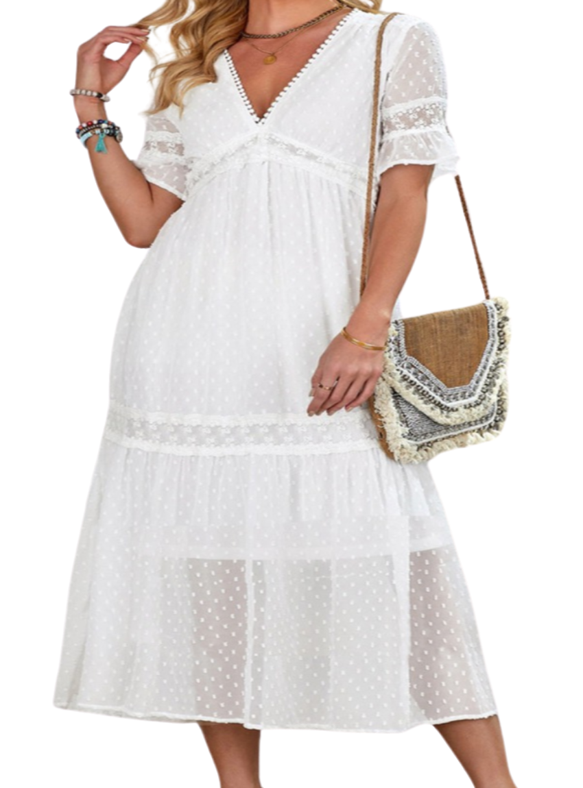 Chic Swiss Dot Midi Dress in white/peach, with a flattering V-neck and airy sleeves, perfect for summer days and elegant evenings.