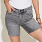 Upgrade your summer look with Judy Blue's High Waist Washed Denim Shorts, tailored for full-size figures seeking style, comfort, and a perfect fit.