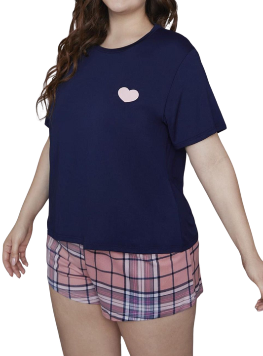 Cozy up in style with our Plus Size Loungewear Set, featuring a cute heart top and comfy plaid shorts. Perfect for relaxing days at home!