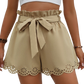Elevate your style with our chic Tie Belt Paperbag Waist Shorts, perfect for any occasion. Available in black and khaki. Shop now!