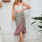 Multicolored paisley skirt with flowing asymmetrical hem.