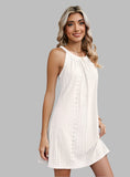 Chic Eyelet Grecian Neck Mini Dress available in 7 hues. Perfect blend of elegance & style for any occasion.