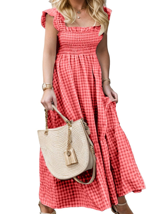 Chic smocked plaid dress with ruffle hem. Available in 4 colors. Perfect blend of comfort and style for any occasion.
