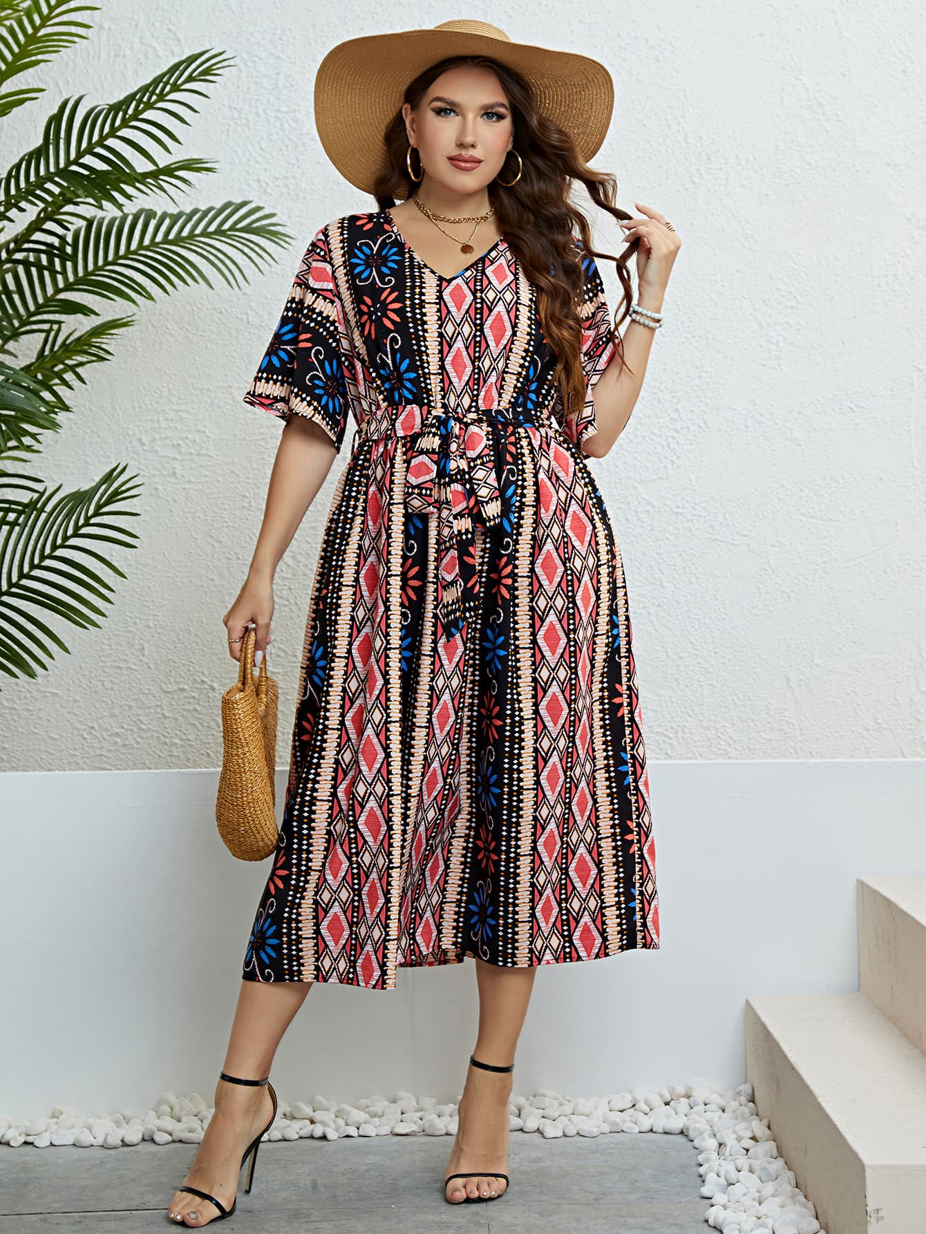 Easy-to-wear slip-on plus-size midi dress with vibrant print