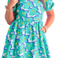 Chic teal or pink printed dress with a square neck and short sleeves, perfect for summer style and comfort.