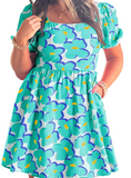 Chic teal or pink printed dress with a square neck and short sleeves, perfect for summer style and comfort.