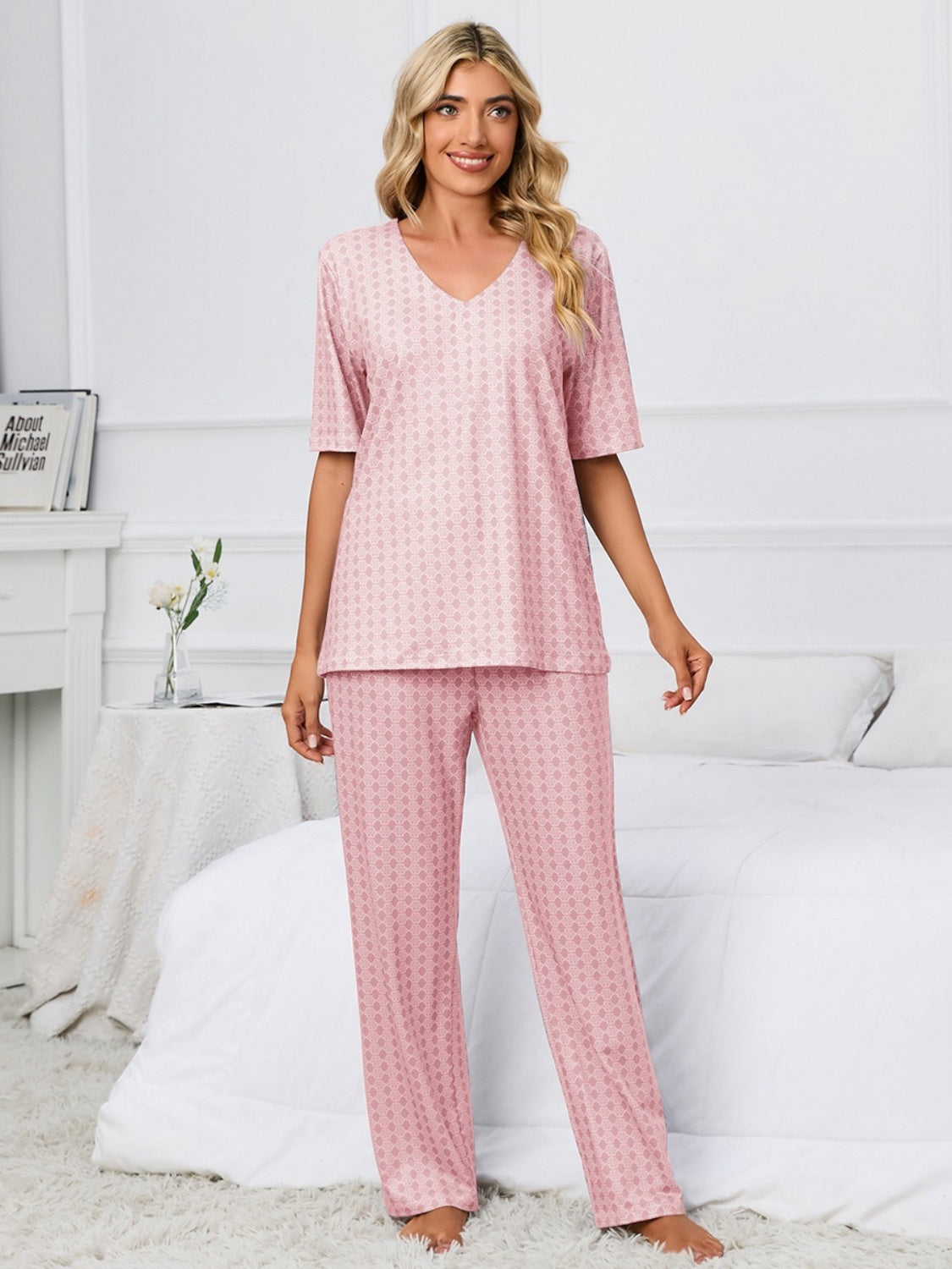 Indulge in luxury with our V-Neck Lounge Set. Available in blue & pink, perfect for stylish comfort at home. Shop now for cozy elegance!