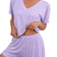 Cozy yet chic V-neck top and shorts set in lavender. Perfect for lounging or casual outings with breathable fabric for all-day comfort.