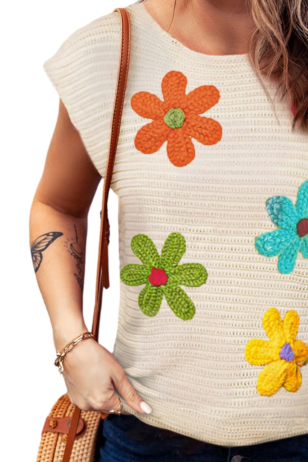 Embrace spring with our Flower Knit Top—perfect for adding a touch of floral charm and comfort to your everyday style