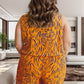 Turn heads in this bold Plus Size Tiger Print Romper. Perfect V-neck fit for a stunning, confident look. Shop now and let your style roar!