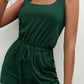 Chic square neck romper with convenient pockets, perfect for versatile summer style. Easy wear, easy care!