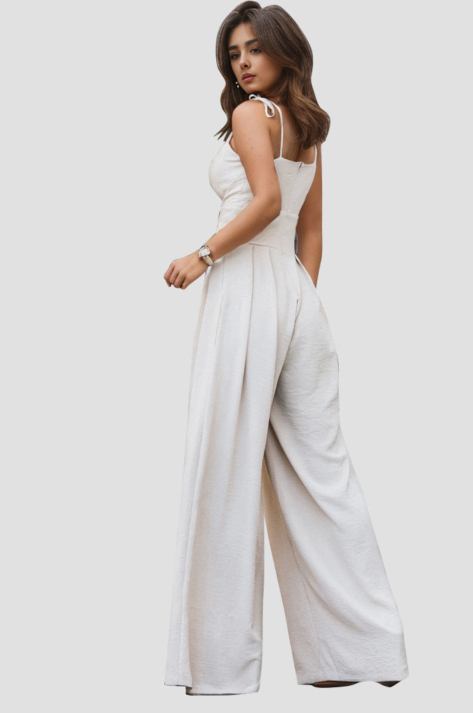 Discover effortless elegance with our Spaghetti Strap Wide Leg Jumpsuit. Versatile, comfortable, and chic – the perfect addition to your wardrobe