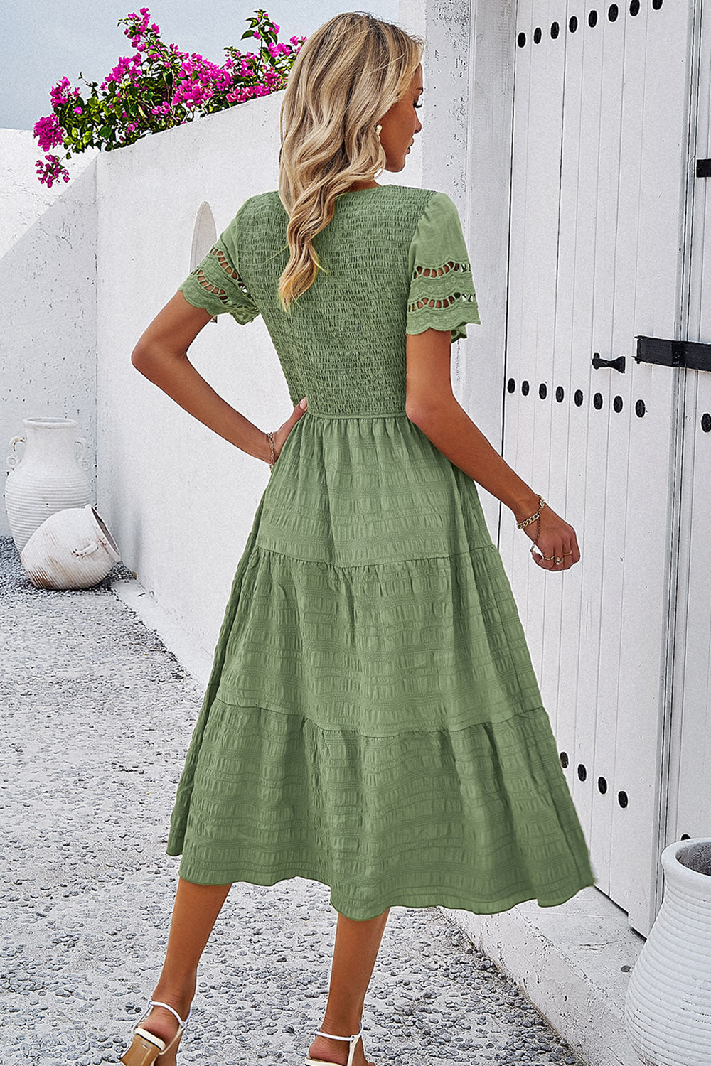 Discover elegance with our Smocked Midi Dress, perfect for any occasion. Comfort meets style in five beautiful colors.
