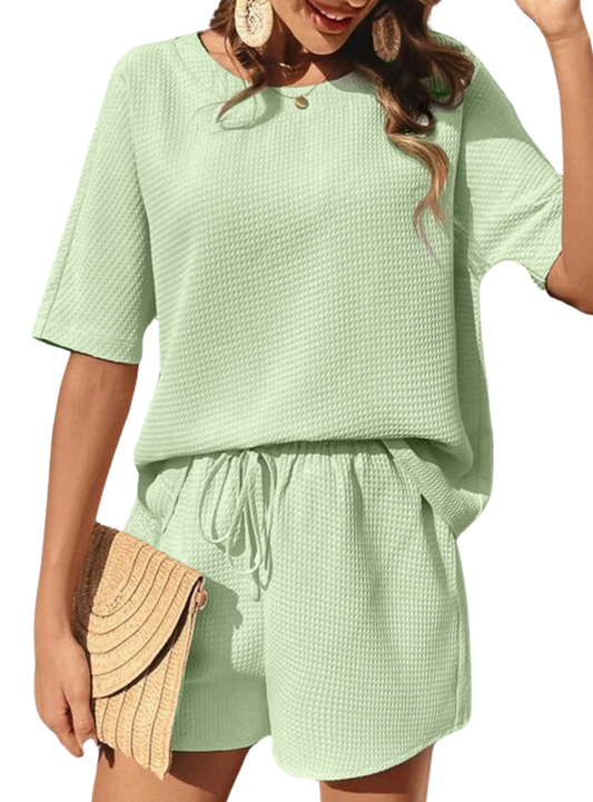 Stay cool and chic in our Waffle-Knit Set. Perfect blend of style and comfort for any summer occasion. Available in 11 colors