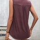 Women's wine-colored tank top with lace detail and button front.